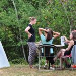 friLingue Estavayer Summer Camp students have class outside