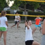 friLingue Estavayer Summer Camp campers play beach volleyball