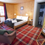 Una camera da letto nello Chalet de Champéry