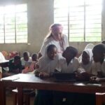 Recoding Africa Director helping students write the script for their film project