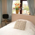 Una stanza da letto di una famiglia ospitante di Kingsway