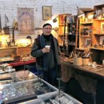 A vendor at the Chelsea Flea Market