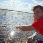 A TLA student on a cruise in the Florida Everglades