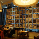 Wall of biographies of the people on the Sgt. Pepper's Lonely Hearts Club band album cover at Blake's Restaurant in Liverpool
