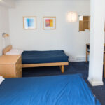 A twin room in Chester House