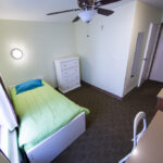 A bedroom in the Vantaggio State Street student residence
