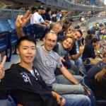 Rennert International New York students watch a baseball game