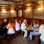 Tie snippets covering the walls and ceiling at the Bear Inn in Oxford, UK