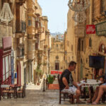 A café in a typical street in La Valletta, Malta