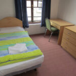 A single bedroom in one of the student residences