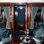 A restored business class lounge in a train at York's National Railway Museum