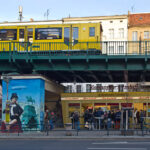 A würstel stand under an S-Bahn track in Berlin