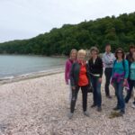 TIS students on the shore
