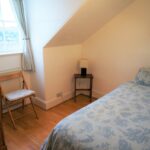 Single bed in a Globe English Centre apartment
