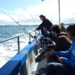 TIS students go on a fishing trip