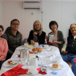 Students of the London Experience course have tea and scones