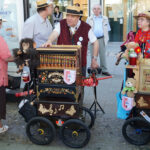 A parade of hand organ players in Berlin 