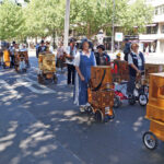 A parade of hand organ players in Berlin 