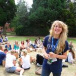 Sir Christopher students relax on the lawn